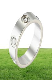 2022 Anillo de acero inoxidable de oro plateado de moda con cristal de diamante para hombres, niñas, mujeres, pareja en anillos de promesa de boda 2514372