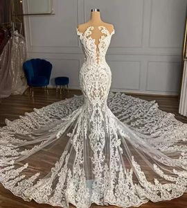 2022 prachtige kanten applique trouwjurken illusie bruidsjurk kapel trein juweel nek mouwloze Afrikaanse plus size dubai vestido de novia