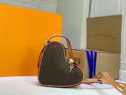 2022 Bolso en forma de corazón Monedero Bolsas de hombro de San Valentín Cartera de cuero Carta clásica Flor antigua Impreso Diseño de lápiz labial Embrague Sac Couer Bolso