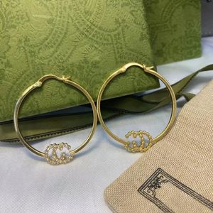 2022 Pendientes de aro de latón con diamantes engastados pendientes de letras diseñador para mujer moda hermosa marca de lujo celebridad mismo estilo nuevo pendiente superior joyería con caja y sello