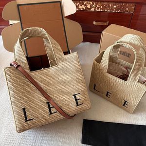 Diseñador Bolsas de bolsas de playa delantera Mujeres Summer bordado Bolso de lujo Coneta tejida de hierba de paja