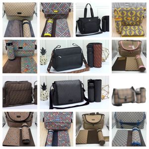 Hot Kids baby Diaper Bag Momie Print Zipper Hasp Leather Cotton Plaid Nappy Stackers Designer Couches Sacs à vendre Concepteurs d'épaule fonctionnels Papa Dry Mumm Bag