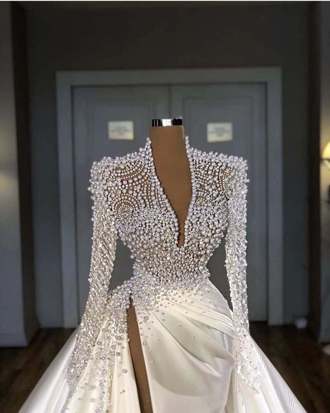 2022 Vestidos de novia de sirena de lujo Bling Cuello en V profundo Ilusión Perlas Cristal Lado alto Dividir Vestidos de novia de satén árabe Robe de ma293x