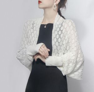 Nouveau automne mode femmes évider tricoté chauve-souris à manches longues mince cape manteau cardigan couleur unie