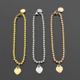2022 Nouvelle chaîne de perles Bracelet à breloques en forme de cœur Marque de luxe Bracelet de créateur Bijoux pour femmes Mode classique en acier inoxydable T Bra2828