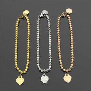 2022 Nouvelle Chaîne De Perles Coeur Charme Bracelet De Luxe Marque Designer Bracelet Femmes Bijoux De Mode Classique En Acier Inoxydable T Bracelets Cadeau De Noël