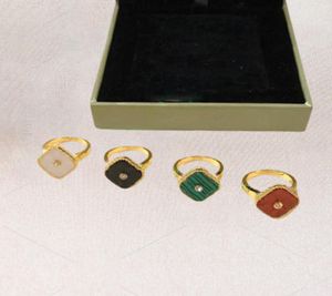 2022 Nuevo anillo de cristal de trébol de cuatro hojas Anillo de bodas de marca de moda para mujeres Anillos de diseñador de turquesa natural de lujo Stee5908045