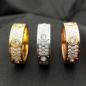 2022 Nouveau luxe 3 rangées de diamants bague d'amour de mode couple anneaux de mariage en cristal designer pour hommes femmes de haute qualité 316L titane S243A