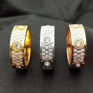 2022 Nouveau luxe 3 rangées de diamants bague d'amour de mode couple anneaux de mariage en cristal designer pour hommes femmes de haute qualité 316L titane S319N