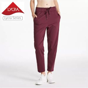 Lycra Fabric de yoga para mujeres Pantalones casuales Stretchy Lounge Sweats Pantalones con pantalones de pista atlética de yoga con cordón