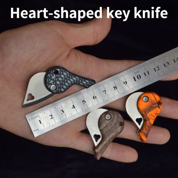 2022 Cuchillo en forma de corazón más nuevo EDC Creativo Mini cuchillo plegable portátil llave portátil Cuchillo de camping al aire libre Pocket Keychain Cuchillos Oficina Sacapuntas de lápiz Joyas Herramienta