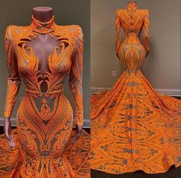 2022 Orange Sirène Robes de bal à manches longues Deep V cou cou sexy paillettes africaines filles noires en queue de poisson en queue de poisson robe C051903