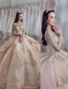 2022 Champagne de luxe sexy Quinceanera Robes robes de bouche bijou illusion illusion appliques Crystal perles manches longues Sweet Train9135891