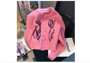 Lente herfst nieuw ontwerp vrouwen o-hals schattige roze kleur single-breasted gebreide borduurbloem trui vest jas