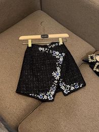 Falda de Tweed de Color puro negro, Mini faldas cortas asimétricas con cuentas de diamantes de imitación, otoño 2023 O3O202330