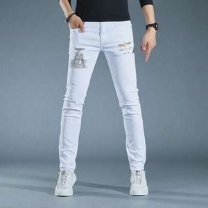 2022 printemps/été haut de gamme brodé blanc mode décontracté Denim taille moyenne pantalons longs jeunesse élastique jean