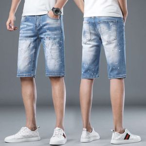 2022 Summer New High End Perforated Ink Splatted Denim Shorts pour hommes Light Luxury Fashion Brand Five Point Korean Edition Trendy Horse Pants