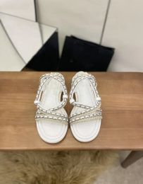 2022 été nouvelles sandales chaîne croix plage chaussures femmes plat tricoté ruban romain chaussures vacances loisirs mode polyvalent