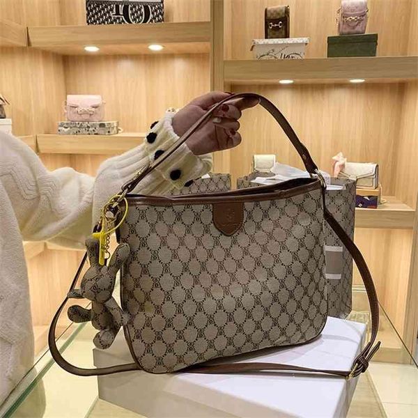 Bolsos de lujo de diseño superior para mujer, bolsa diagonal con textura de estilo extranjero francés, alta calidad, gran capacidad, otoño, 2022