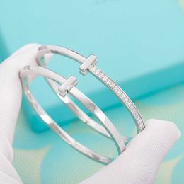2022 Bracelet punk de charme de qualité supérieure Danglein Diamant plaqué à deux couleurs pour femmes bijoux de fiançailles Cadeau avec tampon de boîte PS4992
