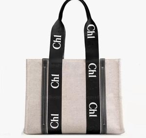 2022 The Tote Bag Canvas Designer Bag Famoso Shopping Moda Bolsos de hombro Bolsos de mujer Classic Interior Zipper Large All Season