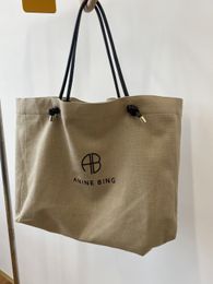 2024 Femmes sacs Lettre de sac à main en toile imprimé grande capacité en cuir manche kaki bureau de voyage Lady Casual Handsbag pour le sac à provisions