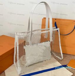 2022 bolsos de playa de verano para mujer, bolsos de diseñador de PVC con Flash láser de lujo para hombres y mujeres, bolsos de hombro transparentes, tote Jelly 33