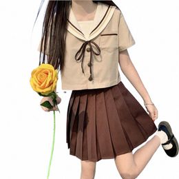2022Japonais orthodoxe petit thé au lait frais marin costume femme collège classe costume doux fille JK uniforme jupe plissée étudiant ensemble w6BZ #