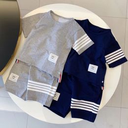 2022SS Child Designer Clother Sets Sport Letter Childrens Kids Kids Short Sleeve T-Shirt Shorts Set Pak Brand Boys Clothing Cotton Tees
