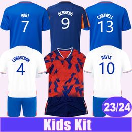 2023 24 HAGI DAVIS Kit para niños Camisetas de fútbol COLAK TAVERNIER CANTWELL KAMARA MATONDO Hogar Azul Visitante 4to Portero Camiseta de fútbol infantil Uniformes