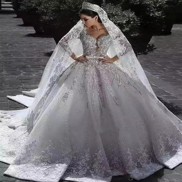 2023 Arabe Charme Une Ligne Robes De Mariée Illusion Pleine Dentelle Appliques Designer Cristal Perles Satin Manches Longues Chapelle Train 2353