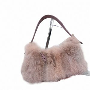 2023 Automne / Hiver Nouveau sac sous les bras de vrais cheveux Versi Fourrure de renard Sac à main épissé avec une nouvelle conception de verrouillage de traction pour le style des femmes o4y9 #