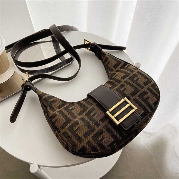 2023 Sacs Outlet Vente en ligne Sacs à main US nouvelle texture d'impression de mode coréenne rétro sac sous les bras polyvalent One Shoulder Messenger Bag Outlet Sales