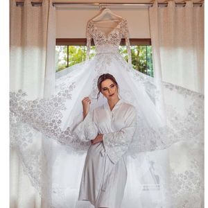 2023 robes de mariée robe de bal robes de mariée formelles une ligne pays bohême plage bijou cou illusion manches longues dentelle appliques perles de cristal fleurs tulle dos ouvert