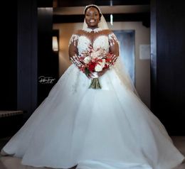 2023 Vestido de fiesta Vestidos de novia Joya de lujo Cuello Cuentas de cristal Ilusión Mangas largas Tul Dubai Árabe Novia Vestidos de novia Tallas grandes