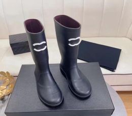 2023 Boot Women Designer Boots Boots Paris Rain Boots Men Gnee High Boties 20 mm de long Arch Eva Plateforme de caoutchouc BOOTS RAIS BRIG6227782