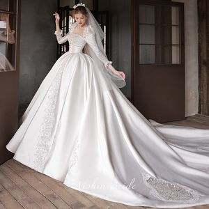 2023 Charmig Strand A-lijn Trouwjurken voor Bruid Vrouwen Boho Plus Size Lange Mouwen Kant Bloemen Sheer Jewel Hals Ruglooze Rechter Trein Bruidsjurk vestidos de novia