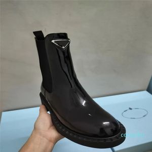 2023 Botas de diseñador con logotipo de triángulo clásico Botas Martin para mujer 100% cuero verdadero Moda Casual Zapatos de mujer versátiles Zapatos de fábrica de alta calidad