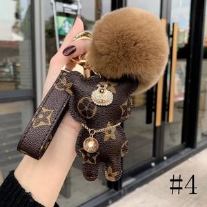 2023 Designer Fashion Key Chain Mono Accessoires Porte-clés en cuir Lettre Motif Cadeau de Noël à son sac à main avec boîte