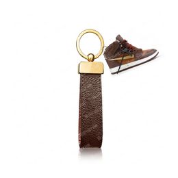 2023 Designer Keychain 65221 met Sneaker Key Holder Buckle Car Keychain Handmade Lederen Keychains Dames Tassen Hanger Accessoires #Kyhn-01 met doos en stofzak