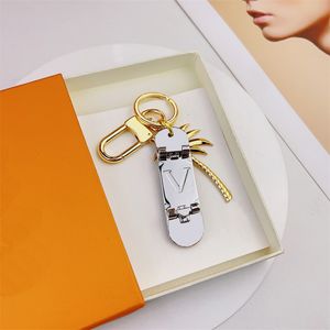 2023 Designer Keychains Skateboard Letter Keychain Bag Charm hanger auto sleutelhanger Gold Key Chain Fashion Mens Women Key Buckle