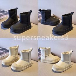 2023 diseñador niño Australia botas cálidas mini media bota de nieve tobillo clásico invierno piel completa mullido satinado botines para niños
