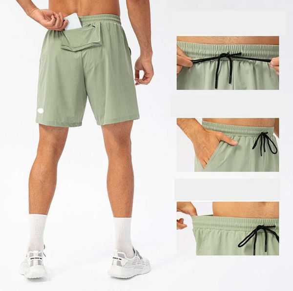 2023 Designer LL Citrons Align Men Yoga Sports Court Short à séchage rapide avec poche arrière Téléphone portable Casual Running Gym Jogger Pant Lu-lu Nouveau style