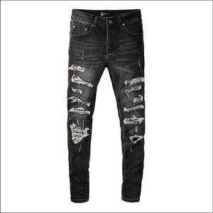 2023 Designer heren jeans modemerk rits gat wassen jean broek retro gescheurde vouw stiksels mannen motorrijden cool slanke broek jeans