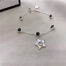 2023 Designer New Fashion bijoux Gujia S925 argent style simple étoile à cinq branches chat spinelle noir bracelet pour hommes et femmes