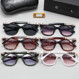 2023 gafas de sol de diseñador hombres mujer gafas de sol con carta diseñador gafas de sol unisex viajando gafas de sol negro gris rojo playa adumbral