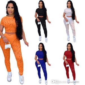 2023 Designer Tracksuits For Women Two -Pally Pants Set Summer Sexy Holed Crew Neck korte mouw Crop Top en Leggings Sport Outfit