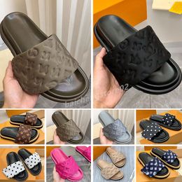 2023 Designers Luxe zwembadkussen Mules Dames Sandalen Zonsondergang Flat Comfort Mules Gevotte voorste riem Slippers Echt lederen modieuze gemakkelijk te dragen dia's B2