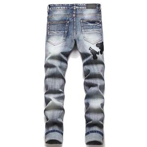 2023 Jeans pour hommes européens et américains Designer Jeans déchirés Hip-Hop High Street Fashion Marque de mode Cyclisme Moto Broderie Pantalon crayon mince ajusté