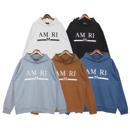 2023 tendencia europea y americana nueva letra AMRI bordado con capucha moda bolsillo suelto negro versátil suéter de manga larga moda S-XL